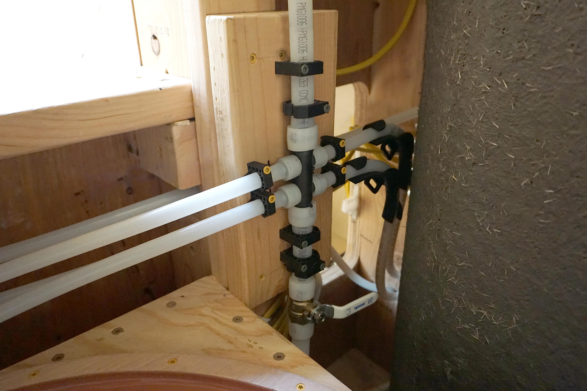 Plumbing inside the utility closet of the dome.