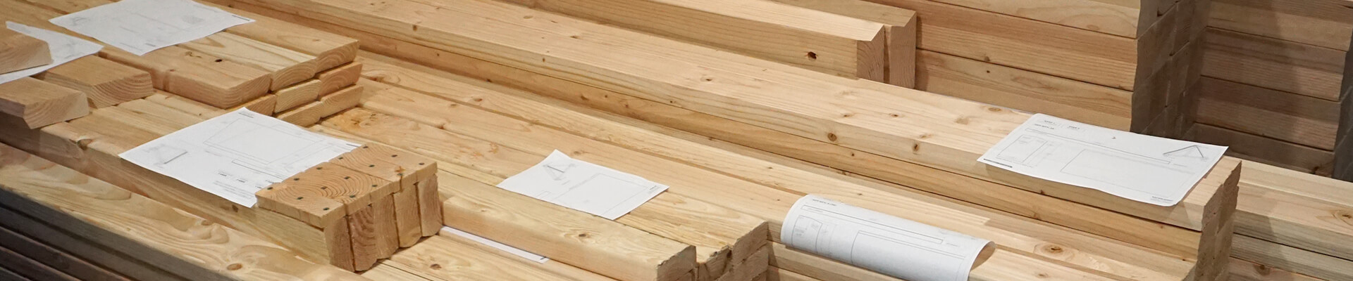 A close-up view of a stack of prefabricated geodesic dome parts.