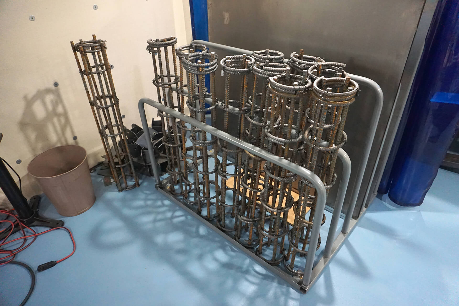 A stack of prefabricated rebar cages.